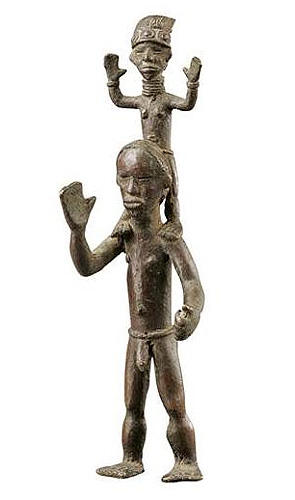 Figure 009001; Ldamie brass caster brass casting Dan 
				Gio people / Liberia; male acrobats; collected in 1962 by Paolo Morigi; brass; 11 in. (28.5 cm); Collection of William Logan Fry; 
                                No. 009001