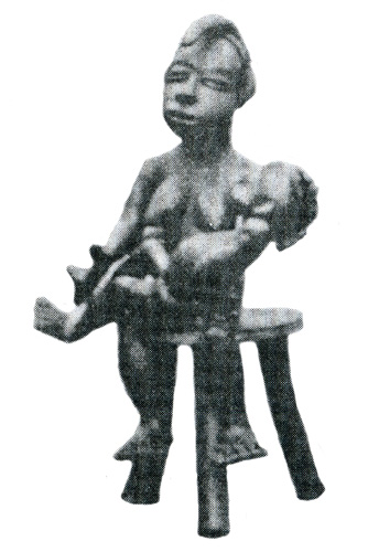 Figure 012004; Artist: Ldamie brass caster brass casting 
				Dan Gio people / Liberia; female figure with baby; collected in 1936-1937 by Etta Becker-Donner. 