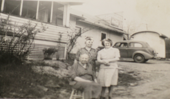 Back of photo says "Grandma's Bowman and Mangus ‏(sic)‏ and great grandma Bowman at house behind Bowman's Grocery in Portage Lakes, Ohio" Note: Bowman not in Snyder family ancestry.