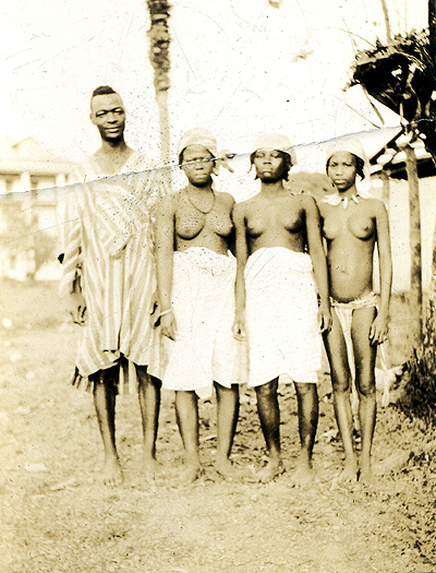 Photograph of man and his three wives in Liberia